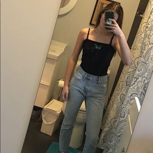 Green butterfly on black tank top!